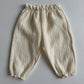 Barnkläder, babykläder,  Barnbyxor framtill beige
