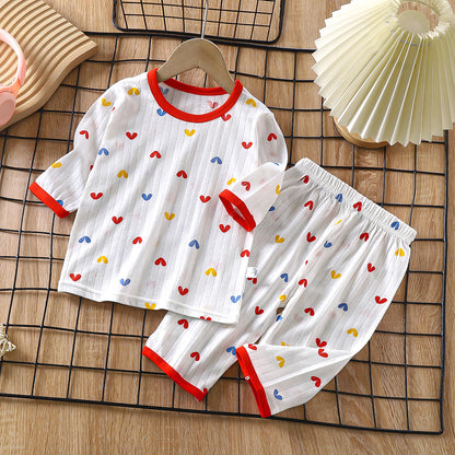 Översiktsbild av färgglatt barn pyjamas set – barnkläder i mjuk bomull