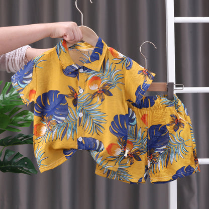 Barnkläder Bebiskläder översiktsbild på tropiskt set med skjorta & shorts för barn, gul