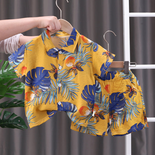 Barnkläder Bebiskläder översiktsbild på tropiskt set med skjorta & shorts för barn, gul