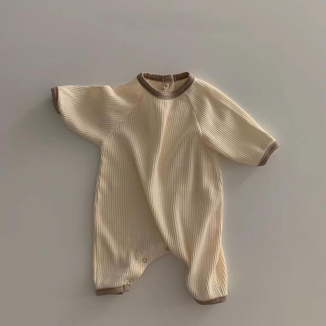 Barnkläder, babykläder, Romper ribbad beige framifrån